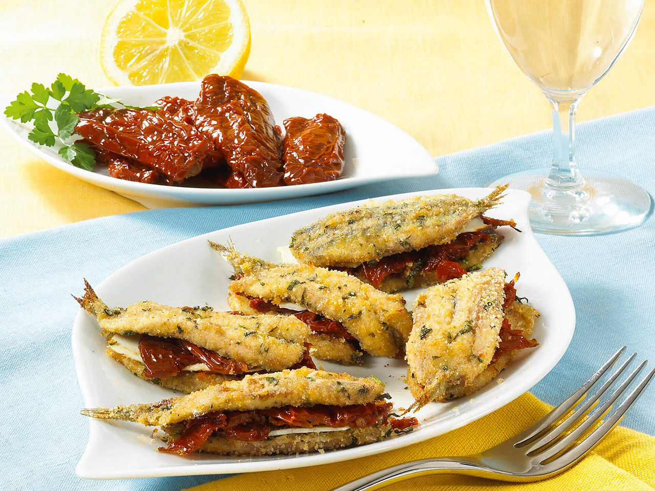 Acciughe fritte con pomodori secchi