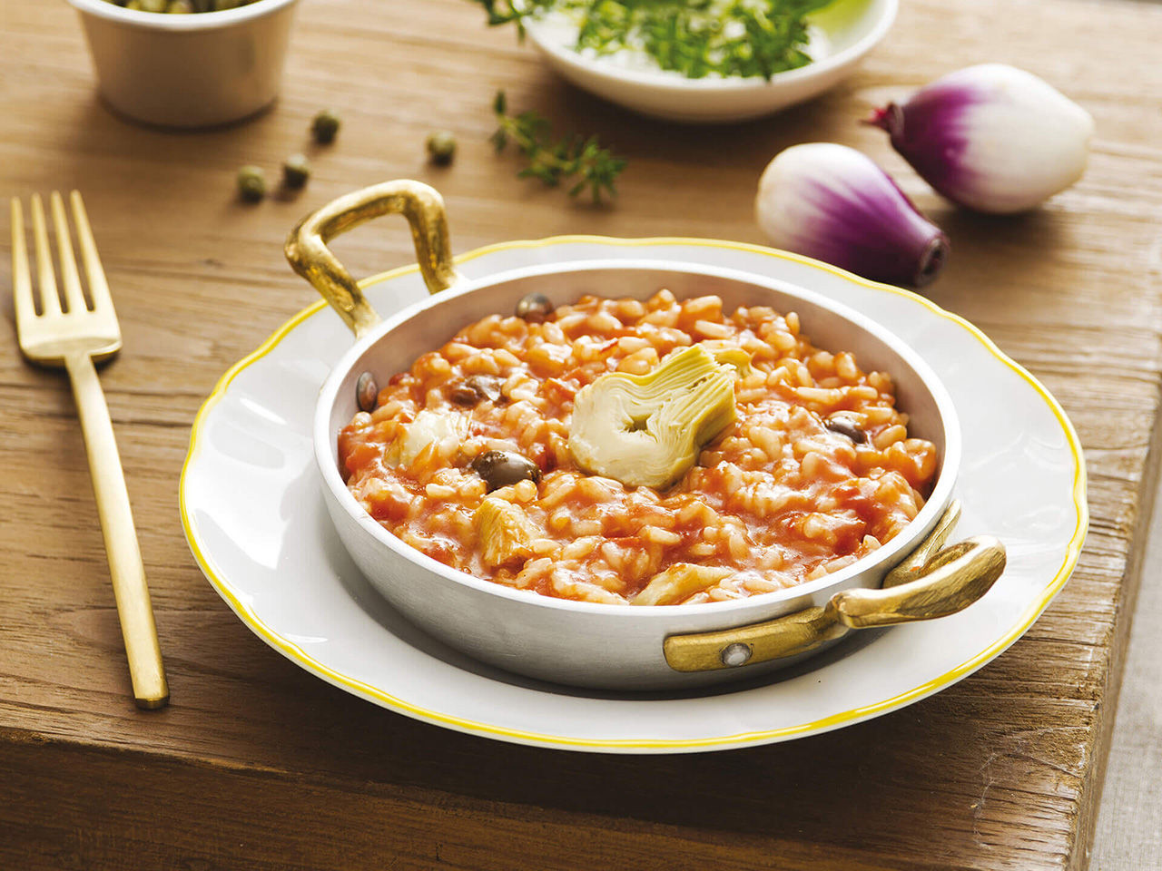 Risotto con carciofi e olive